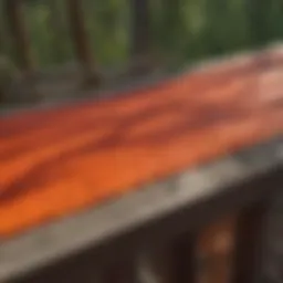 A vibrant application of corral coat paint on a wooden structure