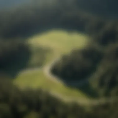 An aerial shot of a paragliding site showcasing the beautiful landscape